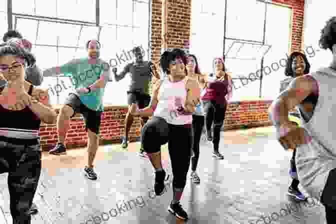 A Group Of People Participating In A Fitness Class At A Community Center THE FASTING CURE: The Easiest And Cheapest Method To Get Super Fit