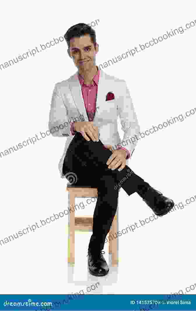Male Model In A Seated Pose With One Leg Crossed And Hands Resting On Knee Art Models DanM211: Figure Drawing Pose Reference (Art Models Poses)